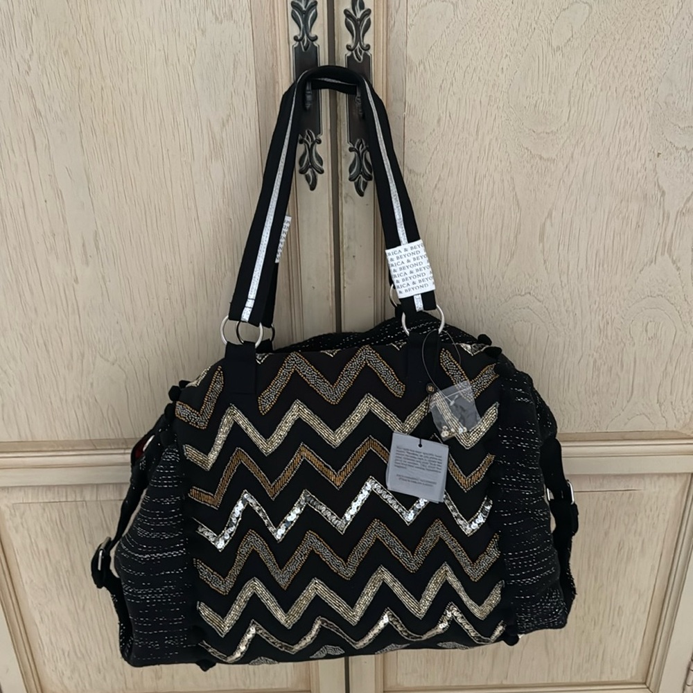 New black tote bag. Americaandbeyond brand. Chevron beaded/sequence on one side